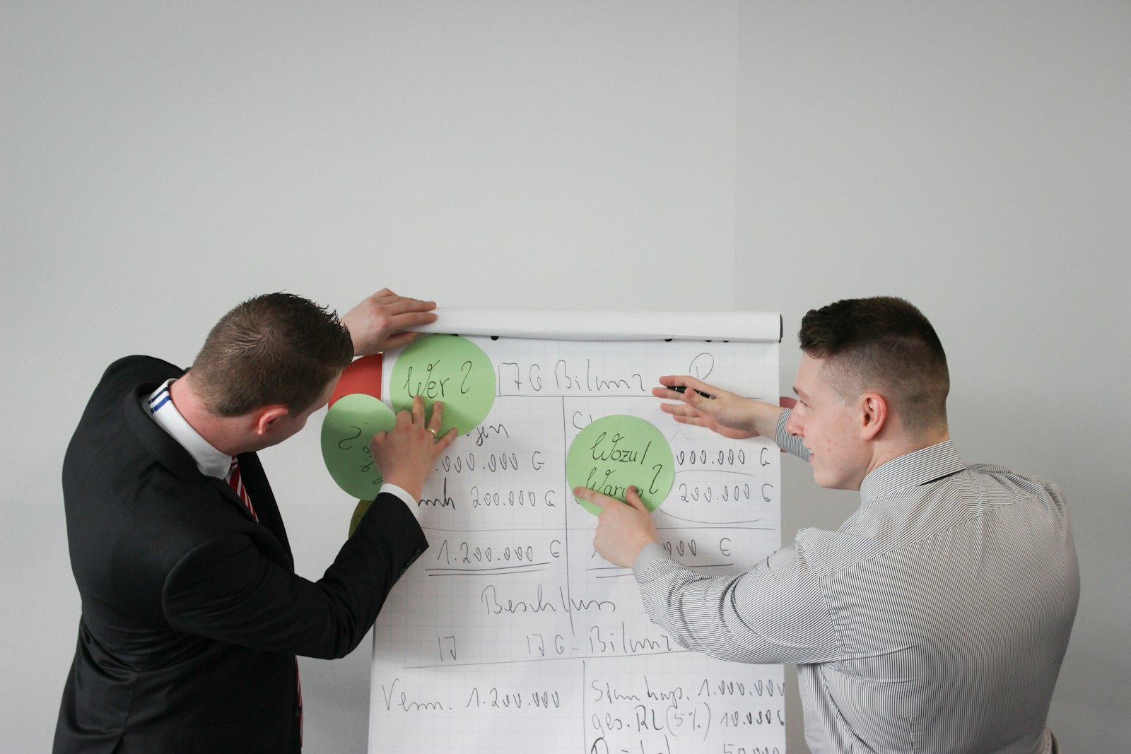 A founder presenting progress to mentors